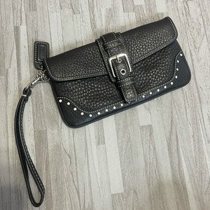Coach black pebbled leather wristlet. Never used!